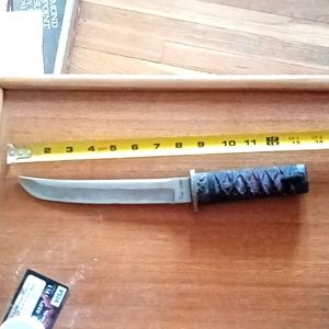 13" Knife with 8" Blade.